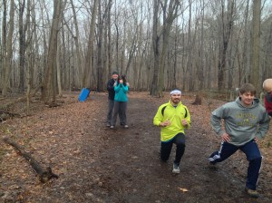 The guys doing lunges and Shelly being camera shy!